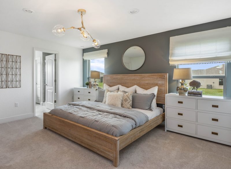 modern-bedroom-with-golden-mid-century-light-fixture